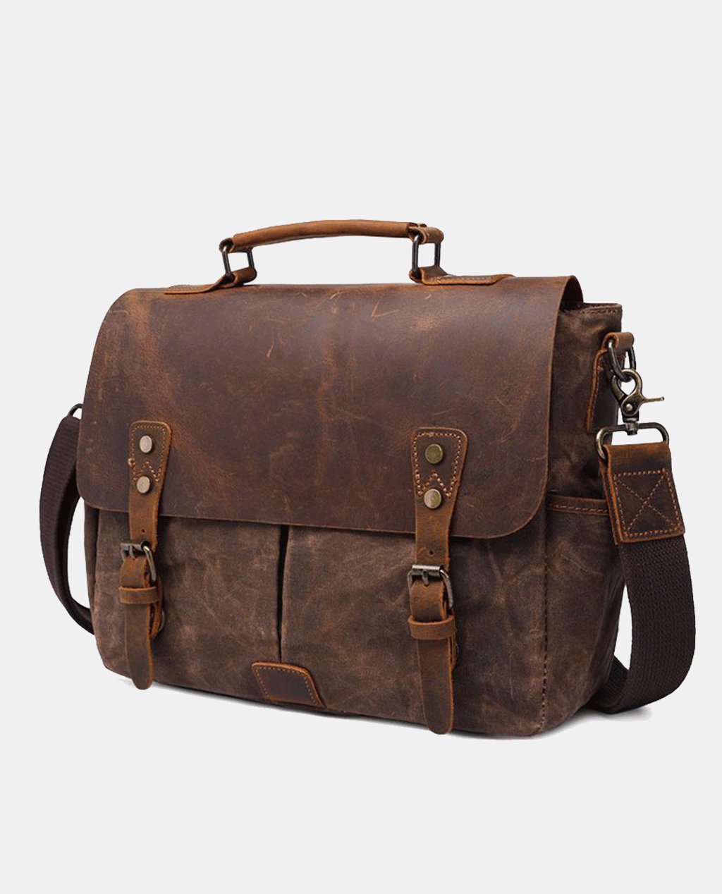 Slight side view of brown canvas messenger bag with leather flap