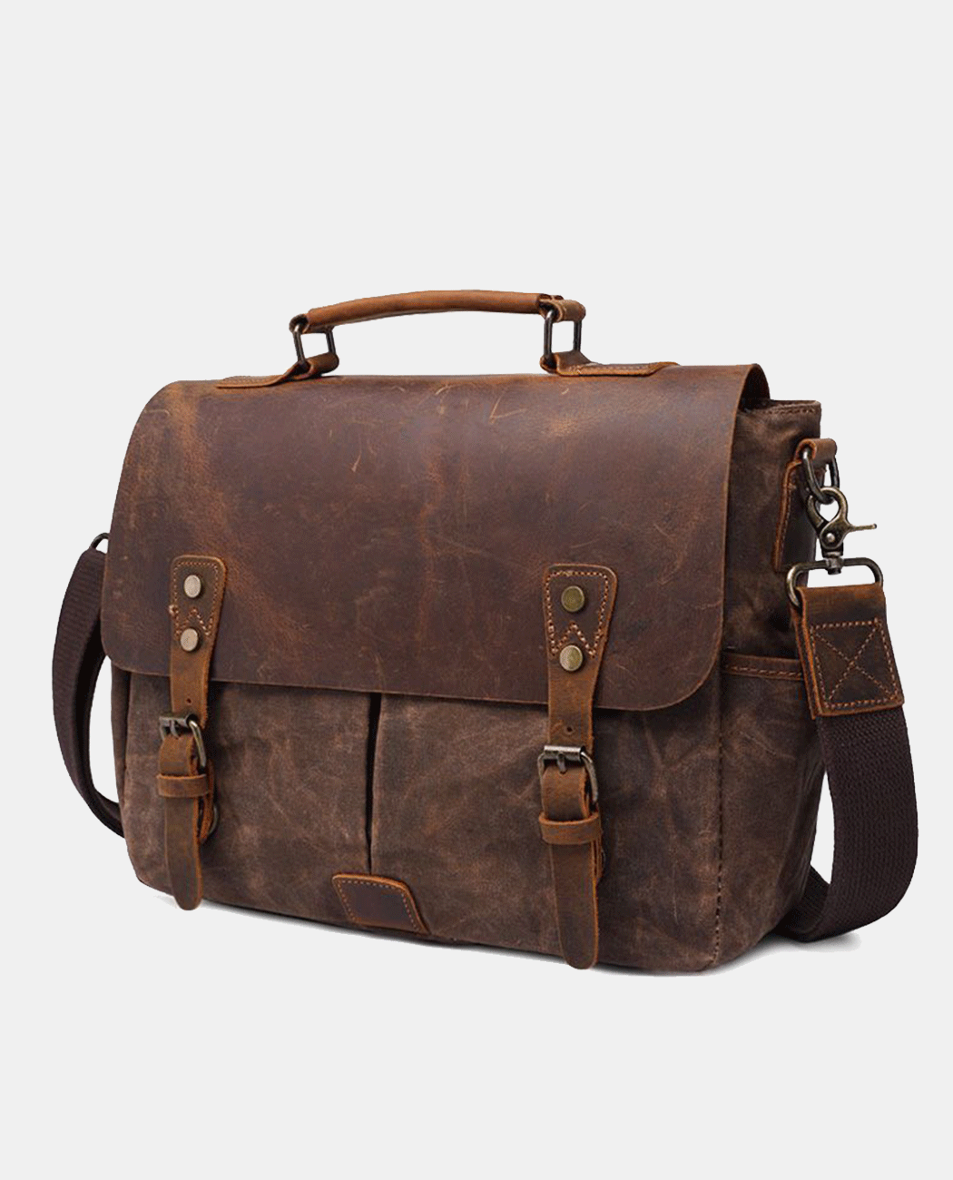 Slight side view of brown canvas messenger bag with leather flap